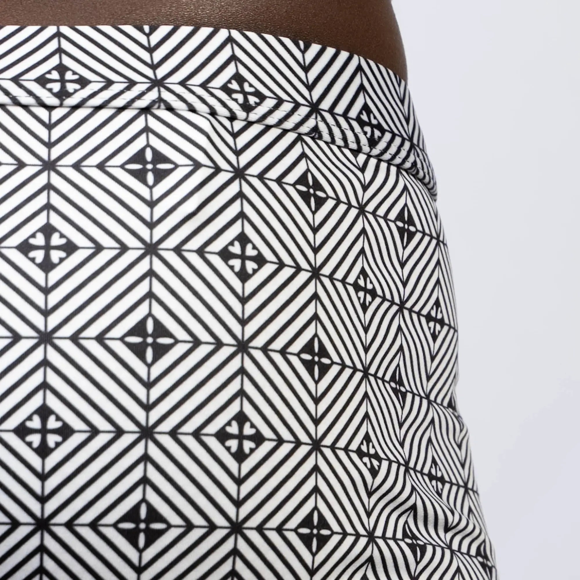 Kaleidoscope sq cut trunk black and white skirt with bold repeating diamond geometric pattern for stylish wear