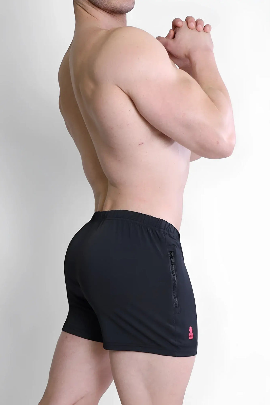 Black karma 2 inch short shorts with pink logo and side zipper pocket for athletic use