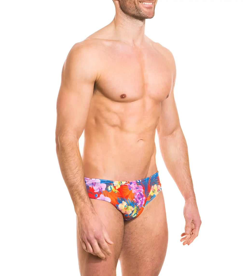 Kiniki continental tan through deep waist bikini swimwear in vibrant tropical floral red blue and purple swim trunks size s