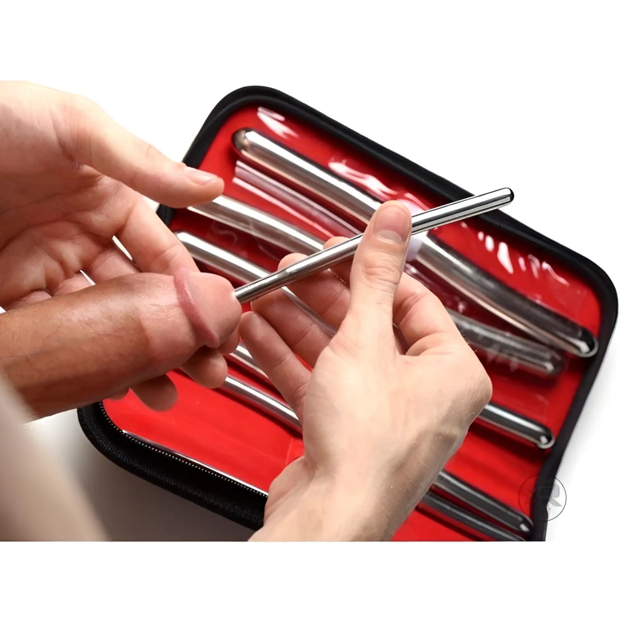 Kink Industries 8-inch silver stainless steel urethral sounds arranged in a black case with red lining.