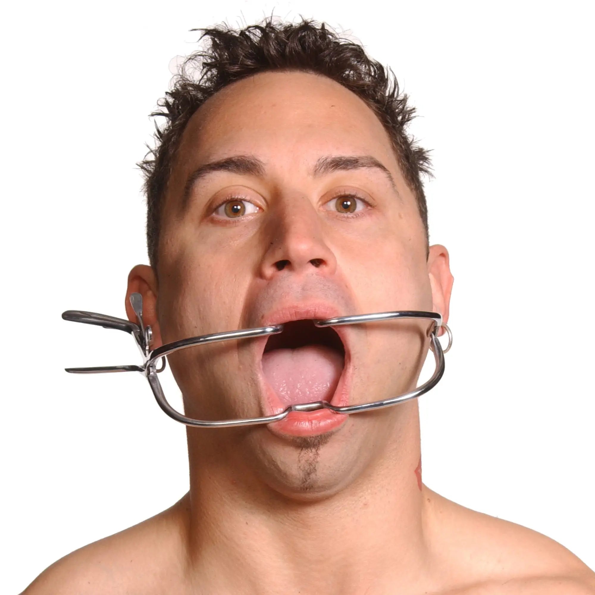 Kink Industries Jennings dental mouth gag: a silver, stainless steel medical-style tool holding a man's mouth open.