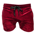 Velvet pocket shorts in rich red velvet with a black drawstring waistband for comfortable casual wear