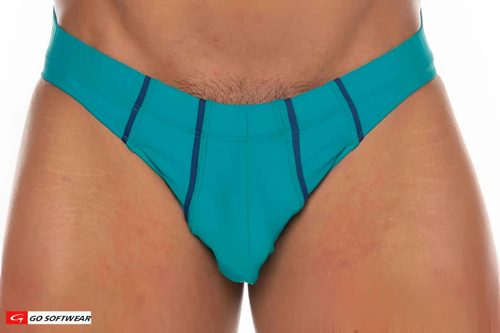 Teal and navy blue athletic briefs with a sleek form-fitting design from la palma buns bikini swim collection