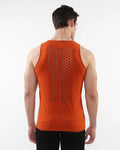 Back view of orange laser cut stretch jersey tank with geometric perforation pattern for athletic wear