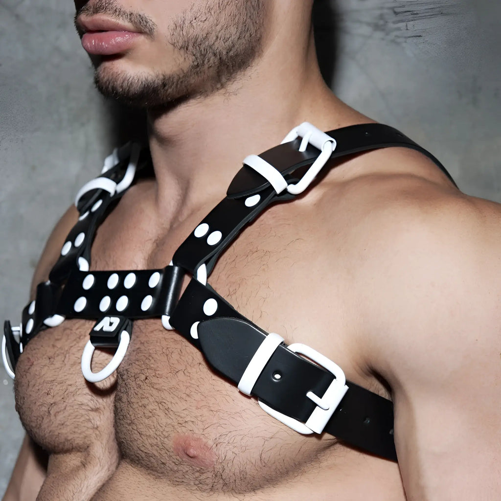 Black leather color harness with white polka dots and matching white buckles for stylish wear