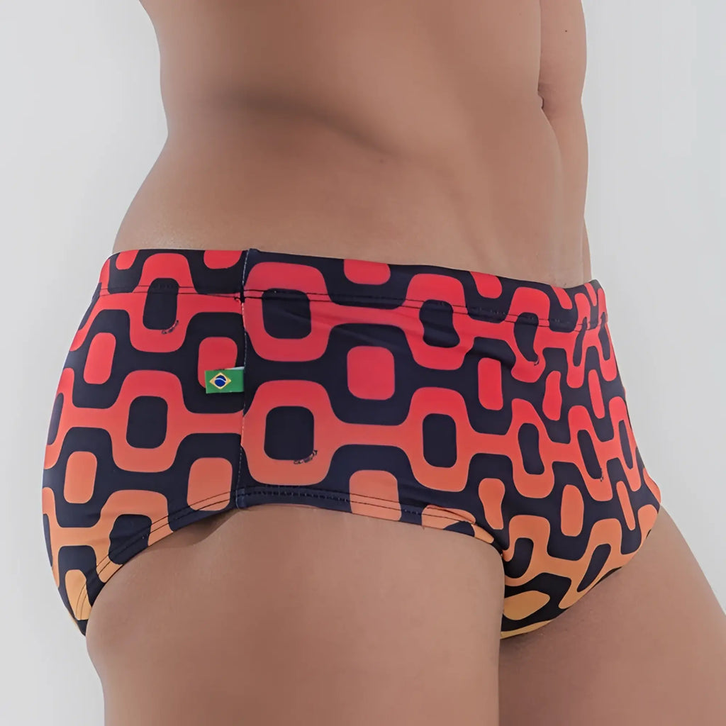 Lebton sunga mens designer swim trunks in vibrant orange and navy blue geometric pattern with brazilian flag patch