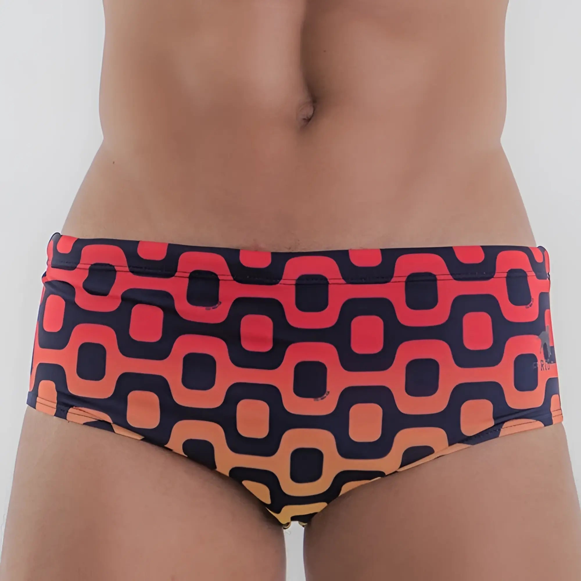 Leblon sunga men’s designer swimwear with vibrant orange and navy blue geometric patterned retro swim trunks