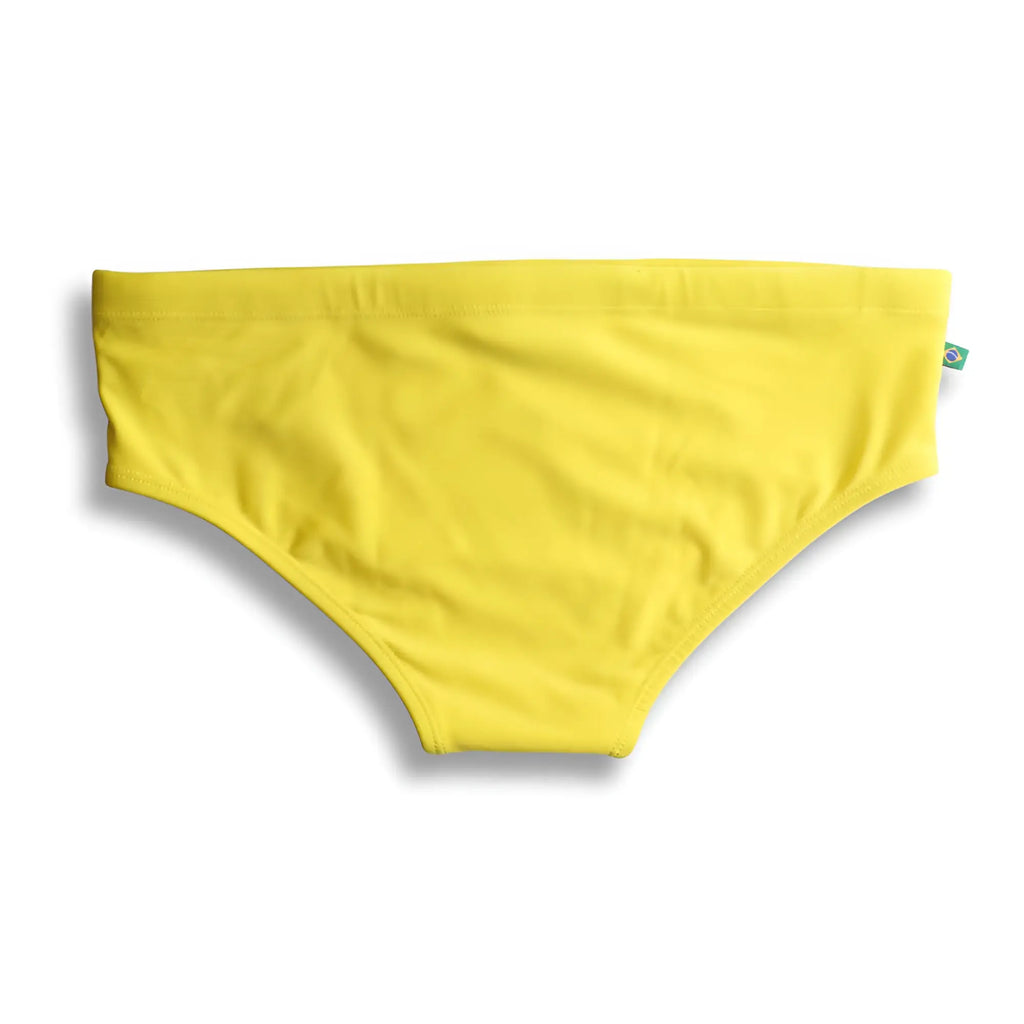 Lemonade yellow solid men’s sunga swim trunks made of bright yellow soft fabric for beachwear