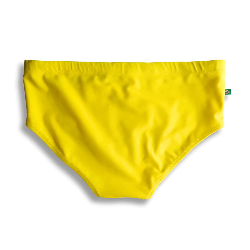 Lemonade yellow solid men’s swimming sunga in bright yellow smooth stretchy fabric with a brazilian flag tag