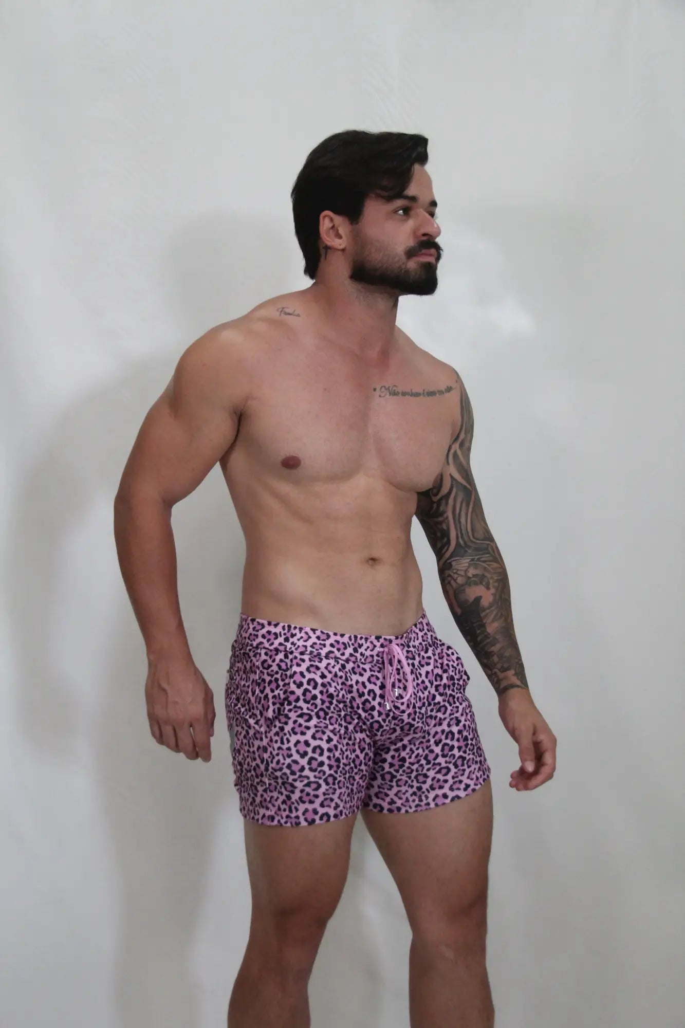 Purple leopard-print fleece swim trunks with matching drawstring for comfortable casual wear