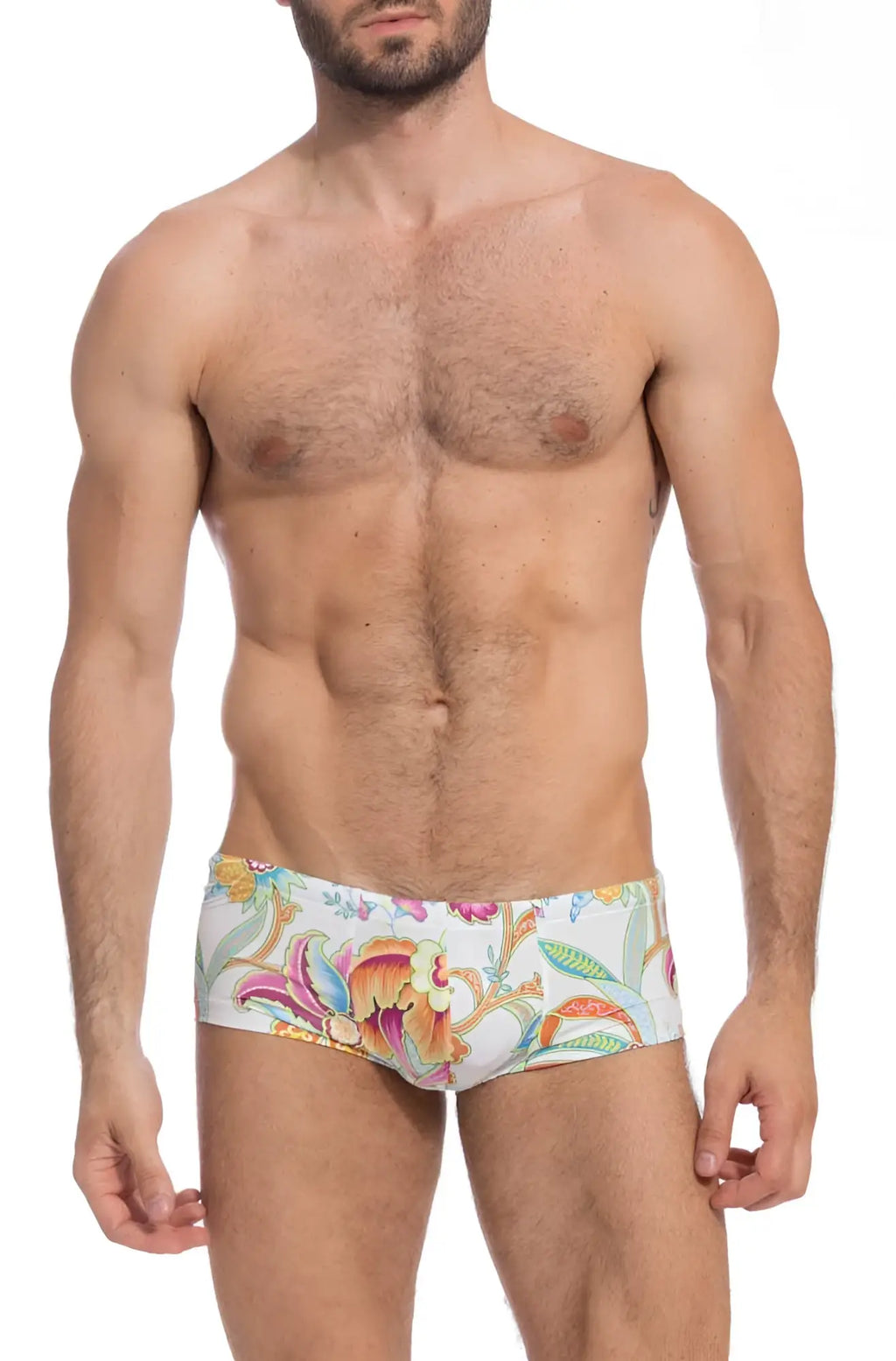 White swim trunks with vibrant pink orange green yellow floral pattern lhomme invisible pattaya hipster square cut trunk swimwear