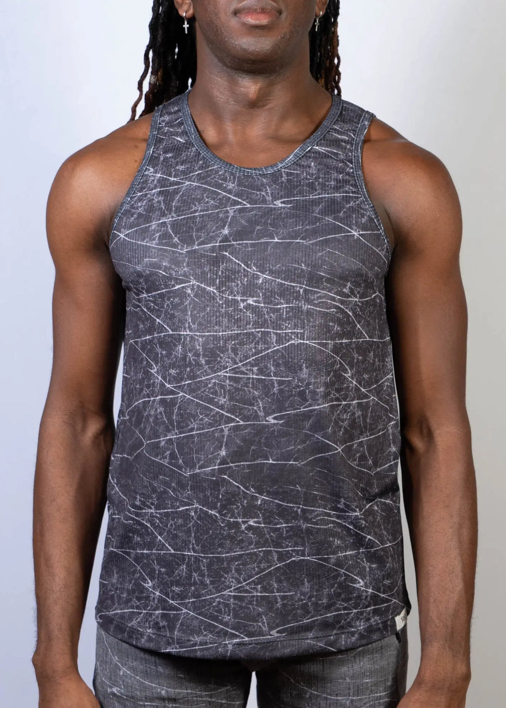 Dark gray lightning print tank top with white marble crackle pattern on breathable fabric for casual wear