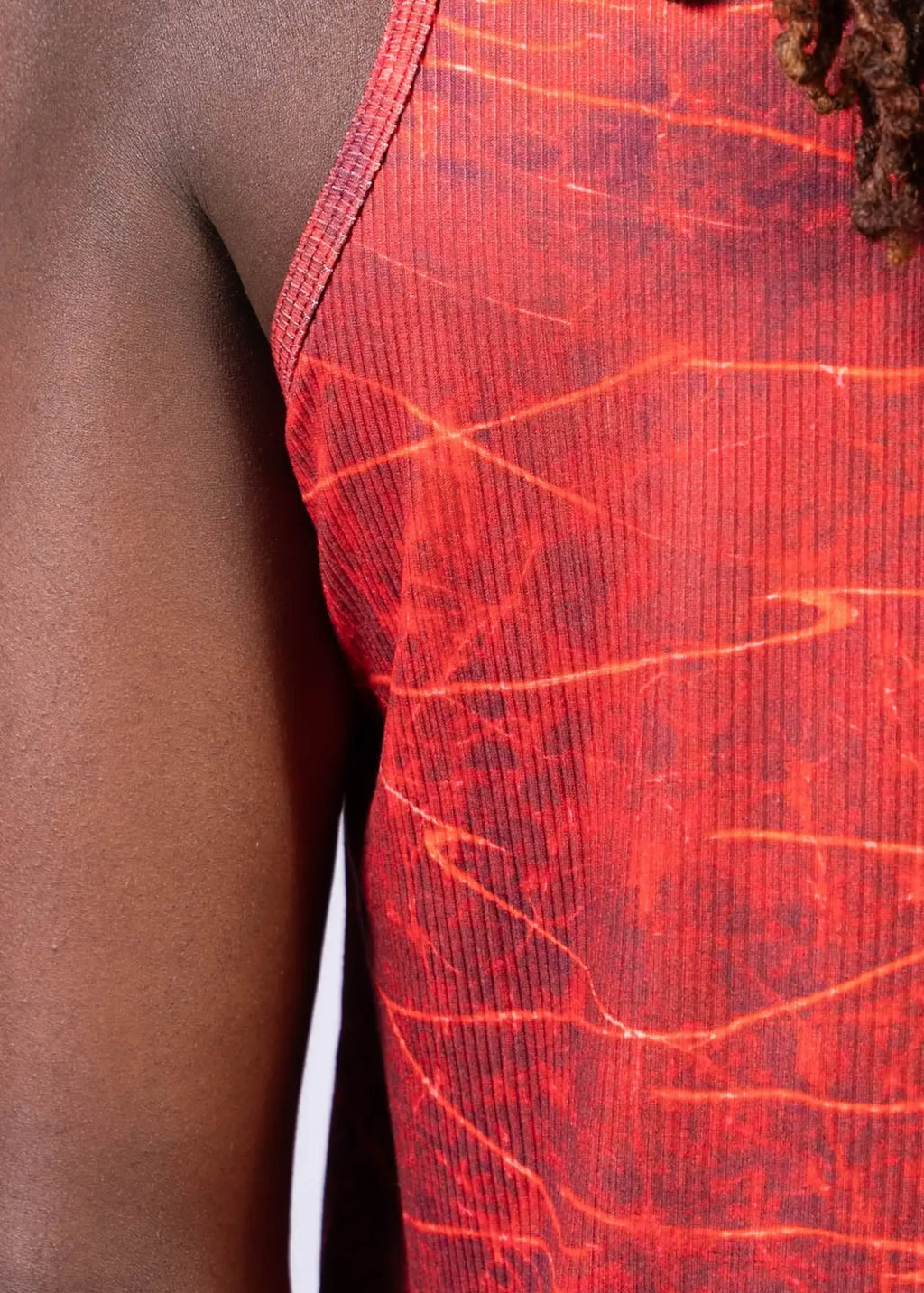 Red ribbed tank top with marbled crackled pattern in orange and dark red from the lightning print tank collection