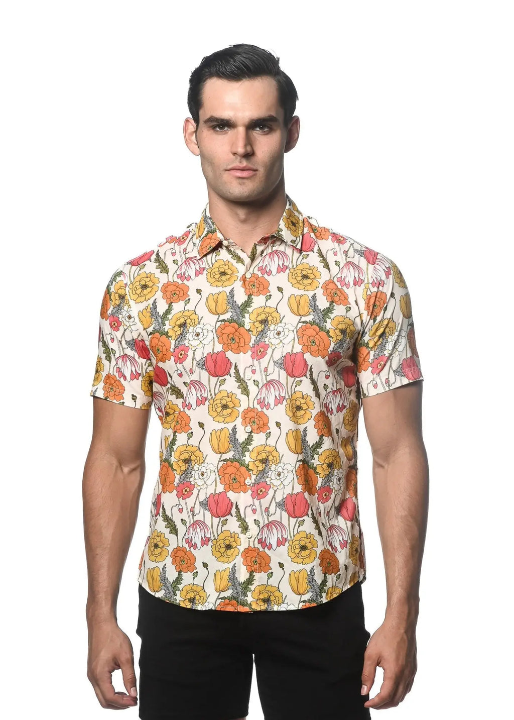 A man wearing a lightweight cotton tencel short sleeve shirt with vibrant orange yellow pink and white floral pattern
