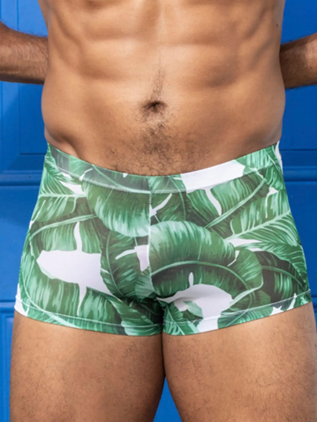 Little boy blue design chris square cut mesh swim trunks with green and white tropical leaf pattern