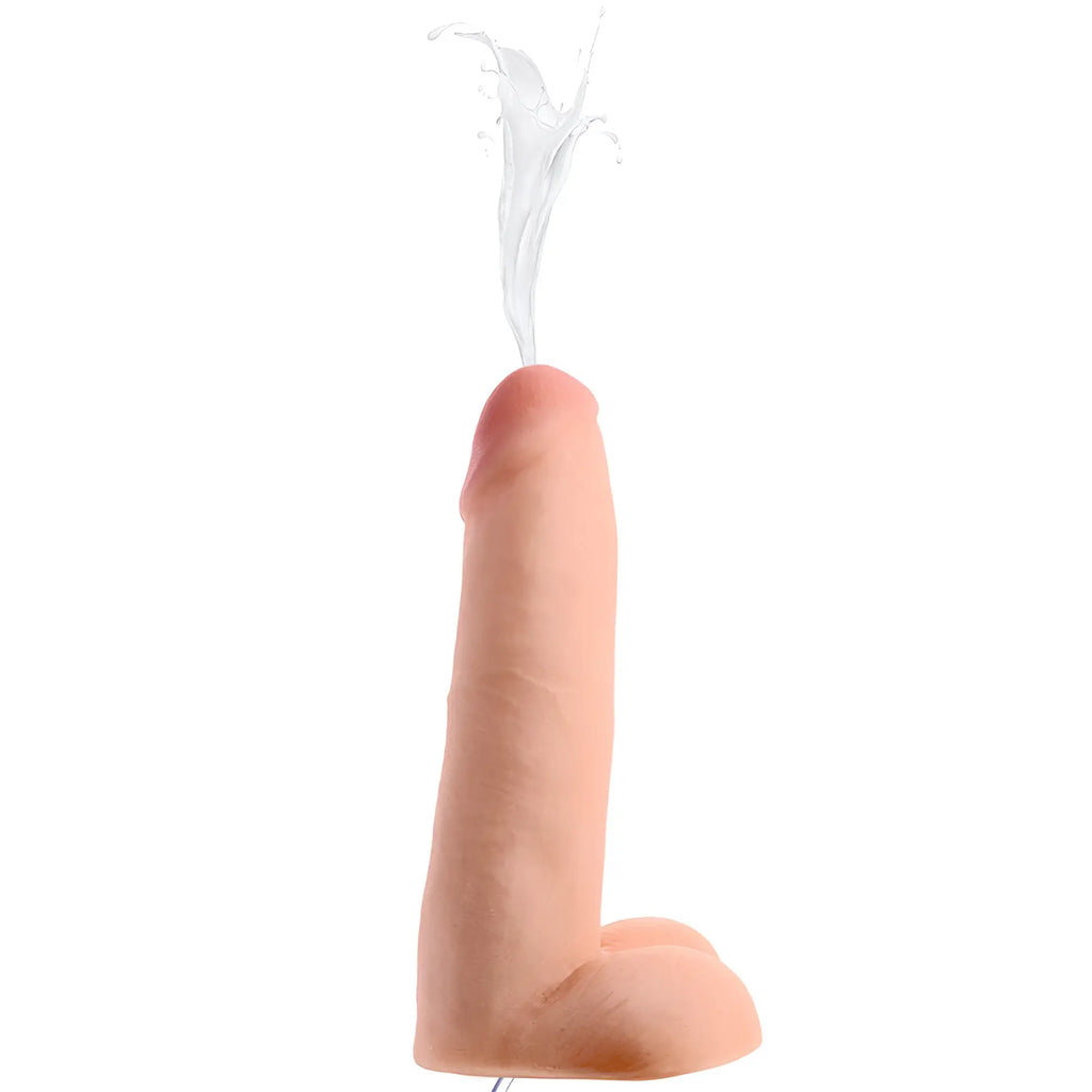 Loadz 8-inch realistic skin-tone dildo squirting liquid from the tip against a white background.