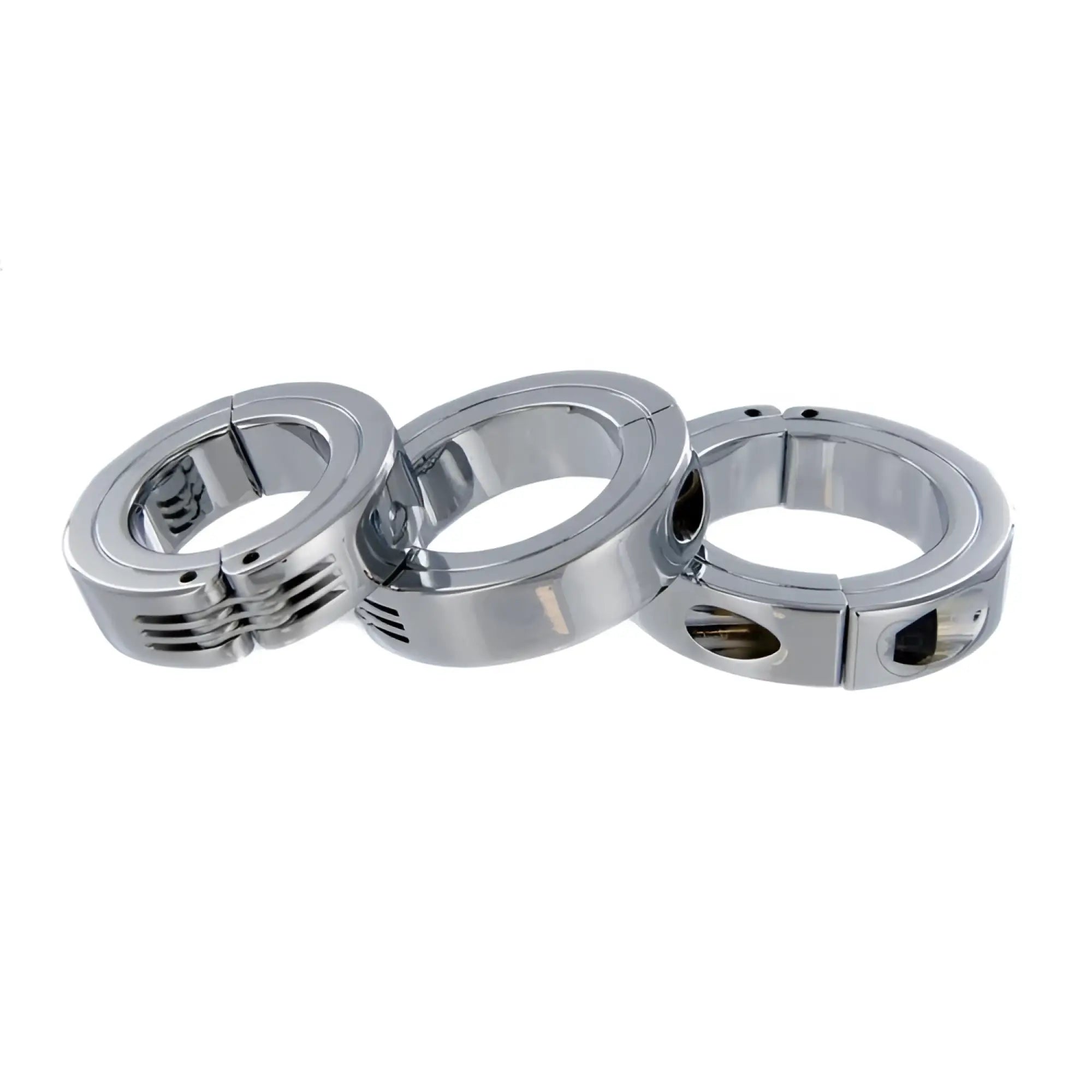 Three chrome-finished locked hinged cock rings with varying metal designs and cutouts for secure wear