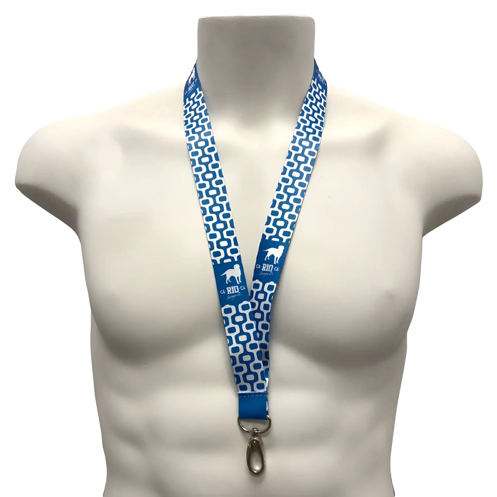 Blue logotipo lanyard with white geometric pattern and cia rio ca logo featuring silver metal clasp for key holding