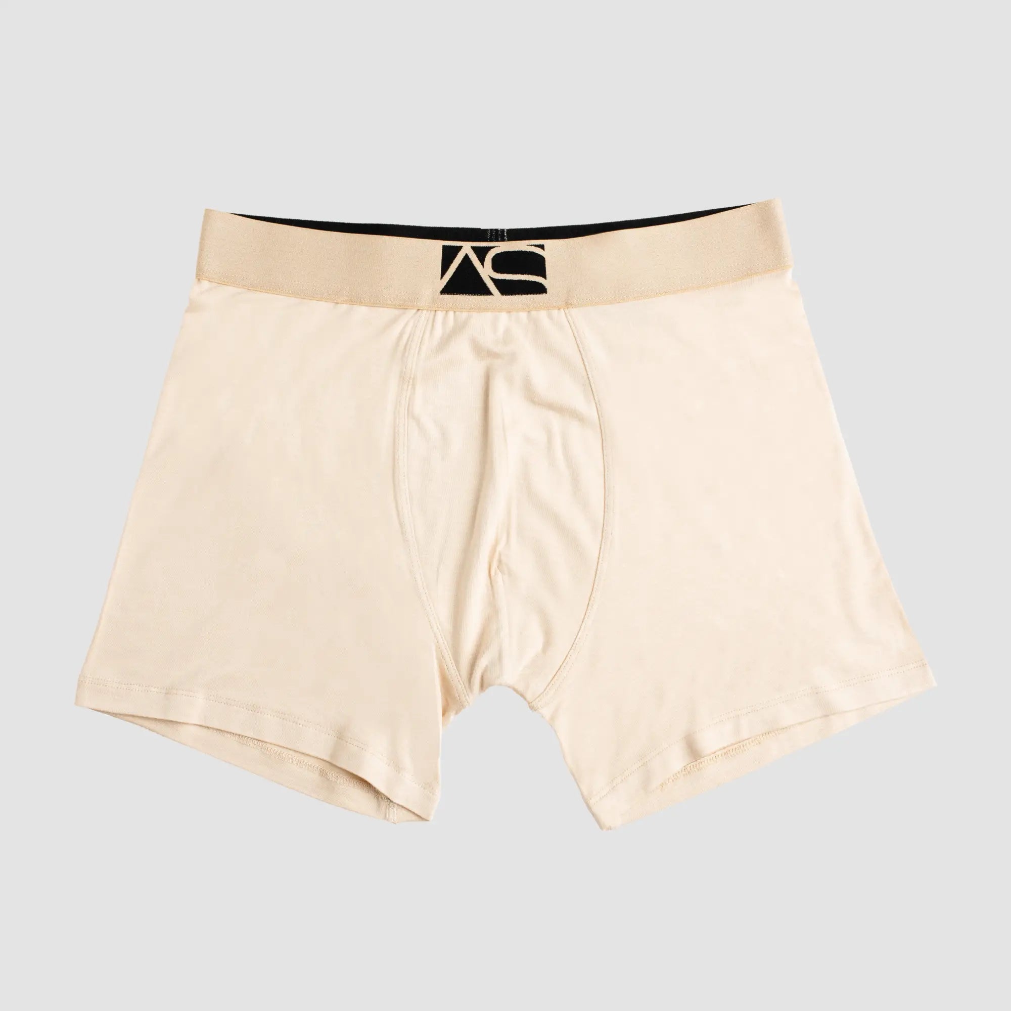 Beige long trunks boxer briefs with black and beige waistband featuring the as logo in front view