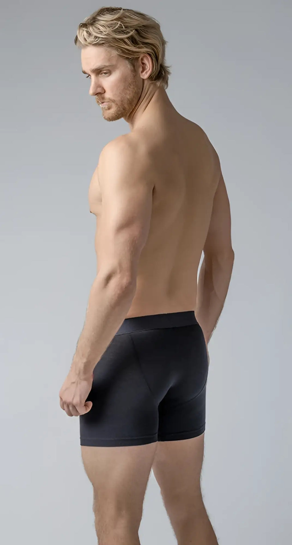 Black long trunks briefs with smooth form-fitting design for comfortable everyday wear