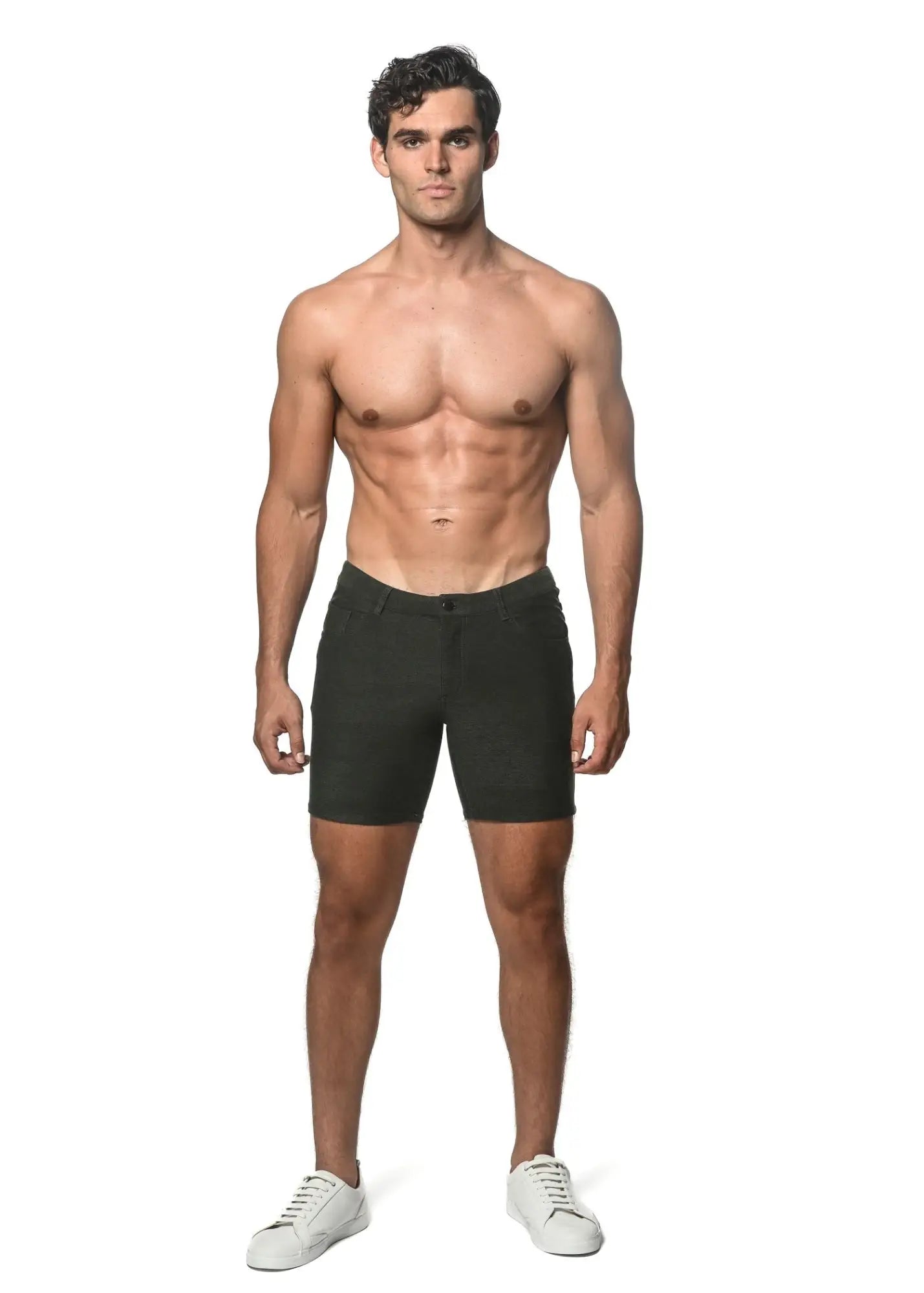 Dark green loopback stretch knit slim-fit men’s shorts with classic five-pocket design and belt loops