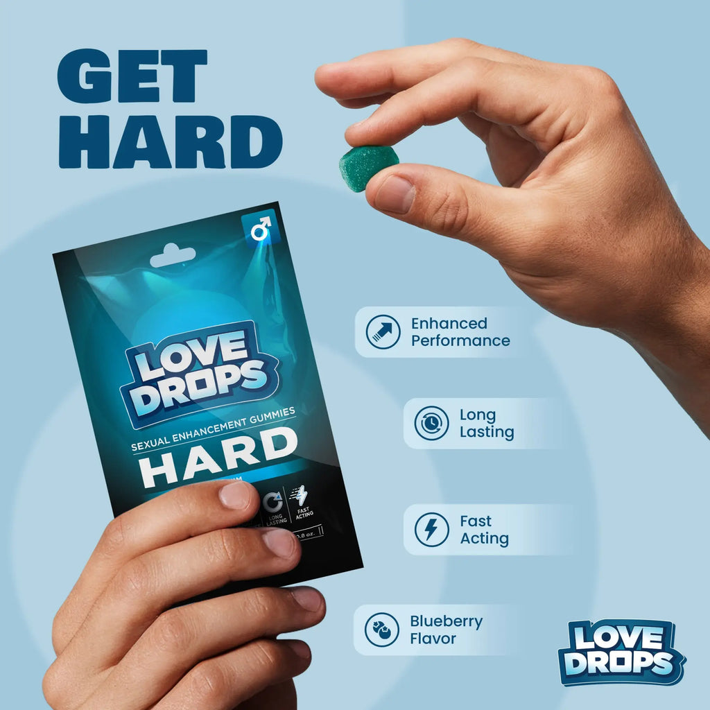 A hand holds a green Love Drops Hard sexual enhancement gummy, with the product packaging shown against a blue background.