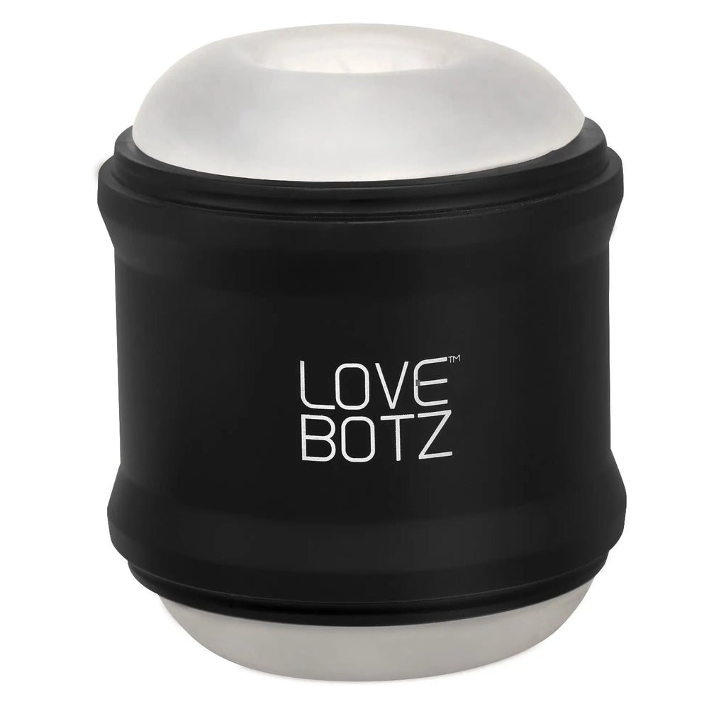 LoveBotz 10X Cyber Stroke masturbator: a cylindrical black device with white branding and translucent silicone ends.