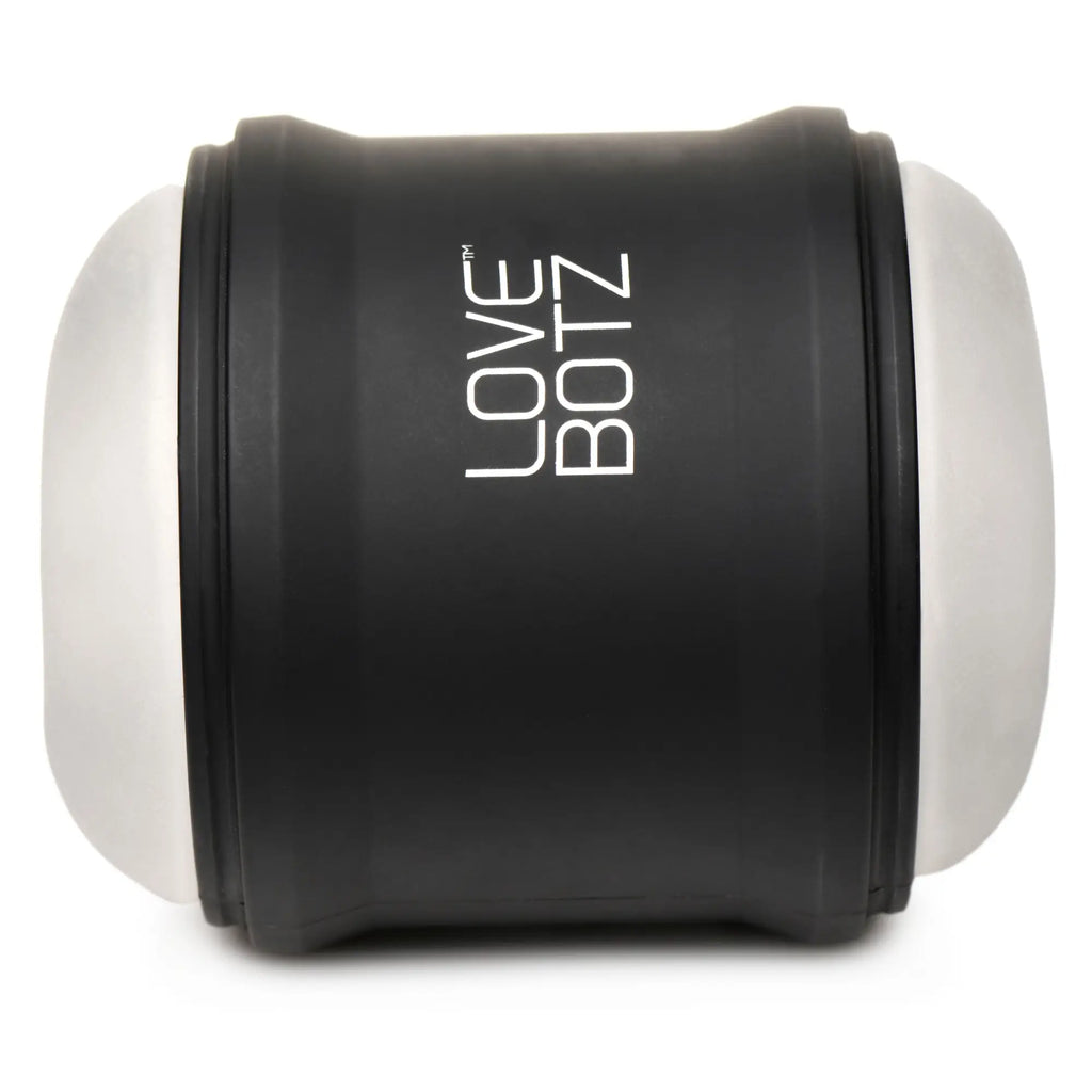 LoveBotz 10X Cyber Stroke masturbator features a cylindrical black casing with white logo and silver textured ends.