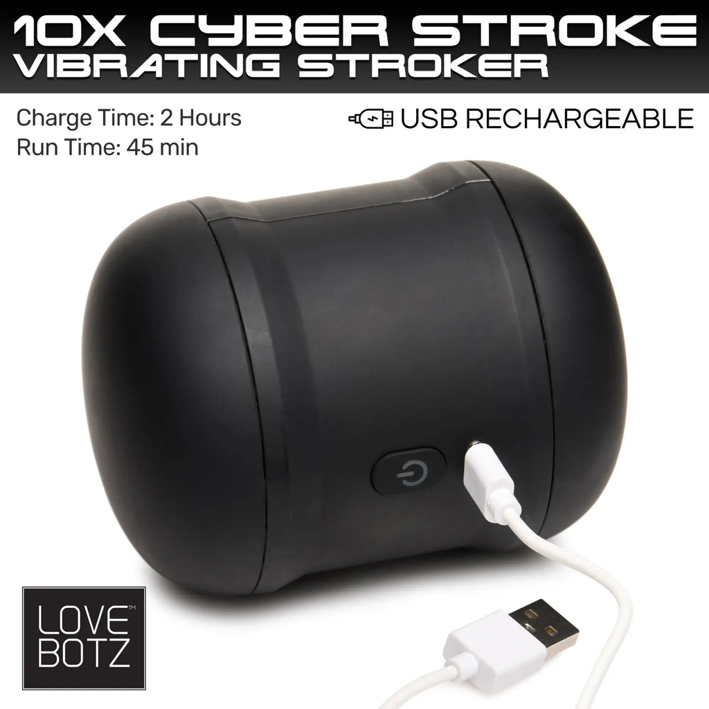LoveBotz 10X Cyber Stroke: A matte black, cylindrical vibrating masturbator being charged by a white USB cable.