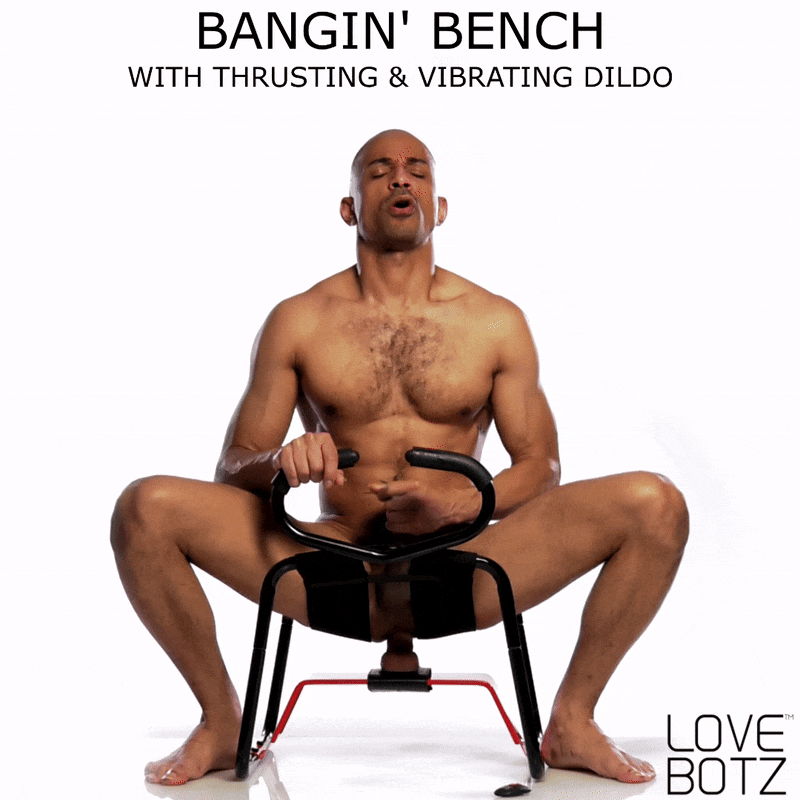 LoveBotz Bangin' Bench with a black metal frame and an integrated, thrusting, and vibrating dildo being used.