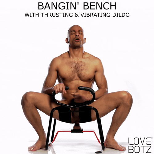 LoveBotz Bangin' Bench with a black metal frame and an integrated, thrusting, and vibrating dildo being used.