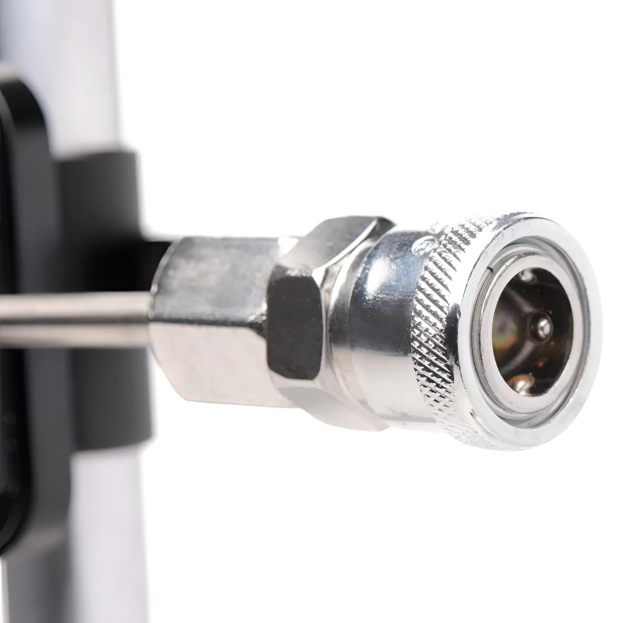 Close-up of the LoveBotz Deluxe Pro-Bang machine's silver metal attachment connector on a black and silver frame.