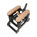 LoveBotz Love Glider machine featuring a black frame, tan padded armrests, and a centered beige phallic attachment.