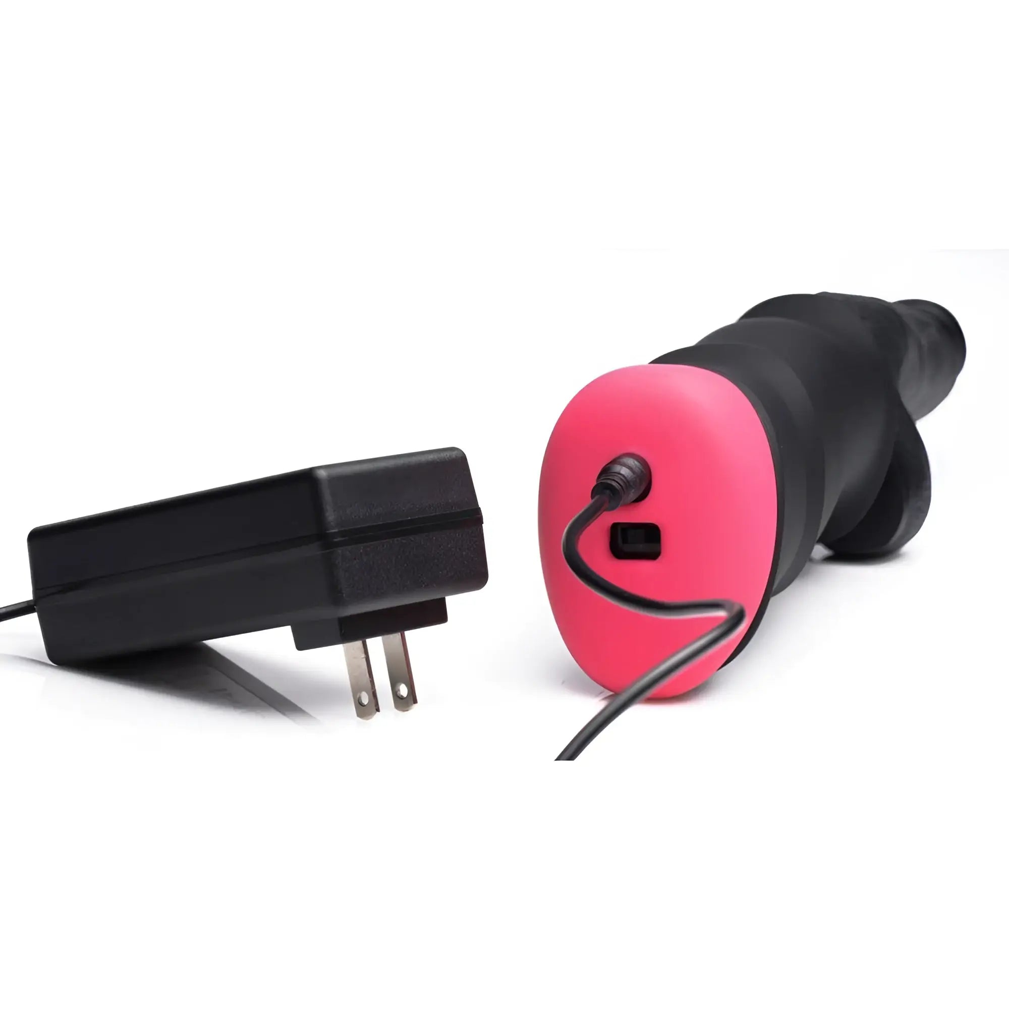 LoveBotz Mega-Pounder silicone dildo with a black shaft, pink base, power cord, and wall plug on a white background.