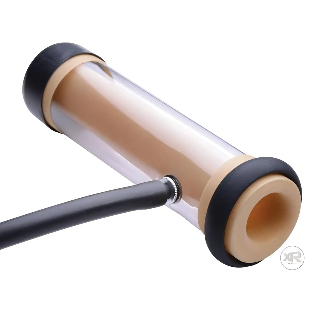 LoveBotz The Milker Automatic Deluxe Stroker: A clear tube with a beige sleeve, black end caps, and an attached hose.