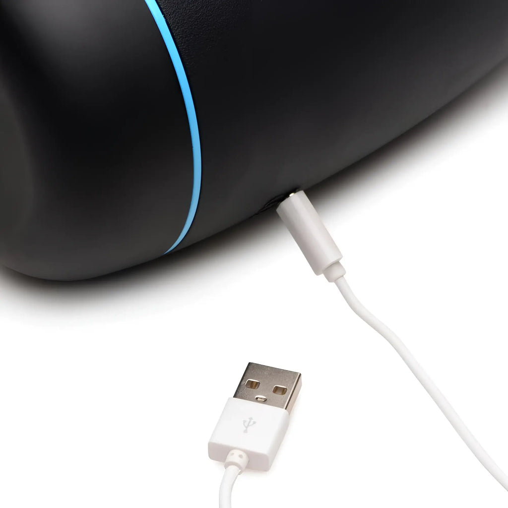 LoveBotz The Milker Extreme 16X in black with blue trim, shown charging via a white USB cable on a white background.