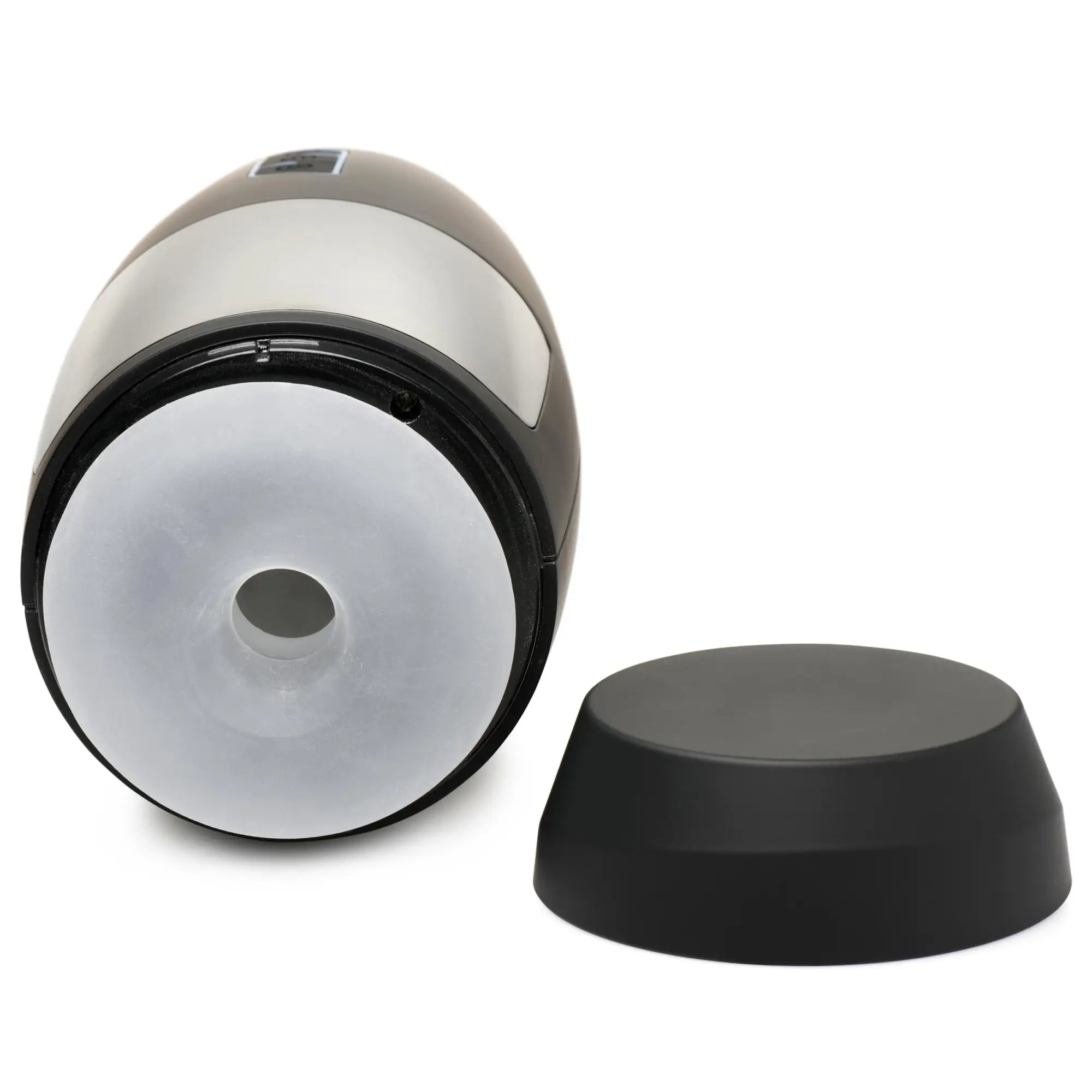 LoveBotz The Milker Slider 18X masturbator in black and silver, featuring a white silicone opening and black base cap.