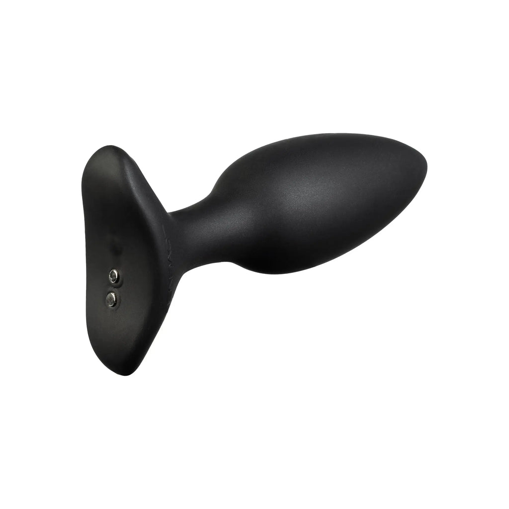 Lovense Hush 2 medium butt plug in matte black, featuring a smooth, teardrop-shaped base and two charging contacts.