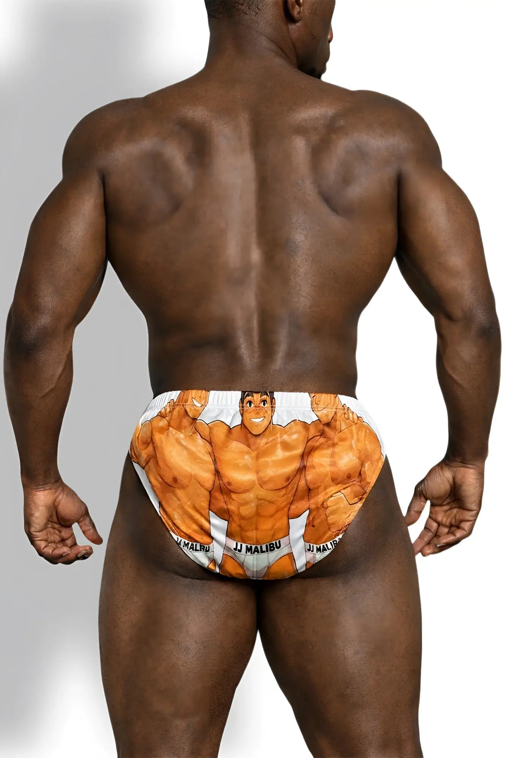 White briefs with vibrant orange cartoon muscular character and j malibu branding on waistband lovesick briefs anime