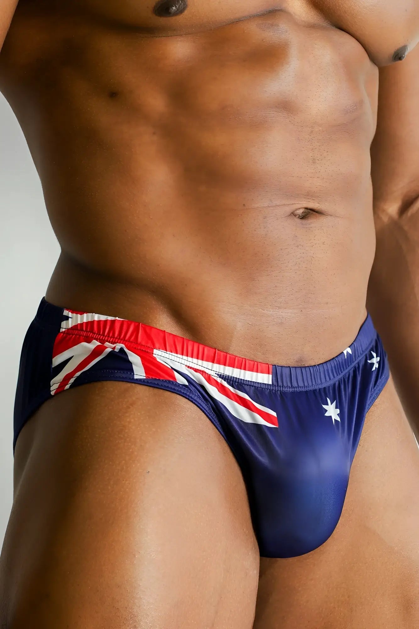 Blue swim trunks with red white and blue australian flag and star motifs lovesick briefs australia flag design