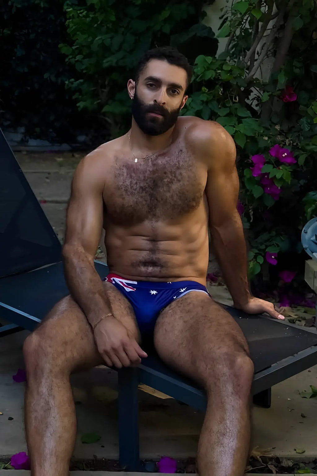 Blue swim trunks with red and white australian flag design called lovesick briefs ideal for swimwear use