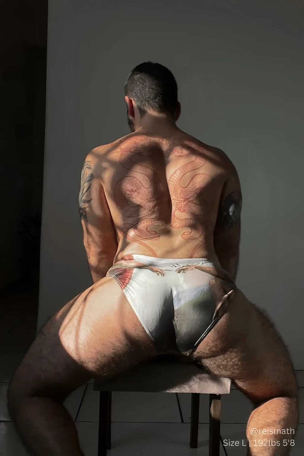 White athletic lovesick briefs with subtle pattern and elastic waistband designed for comfort and support