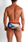 A pair of men’s briefs with a distressed vintage puerto rico flag design in red white and blue for everyday wear