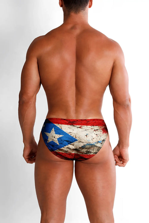 A pair of men’s briefs with a distressed vintage puerto rico flag design in red white and blue for everyday wear
