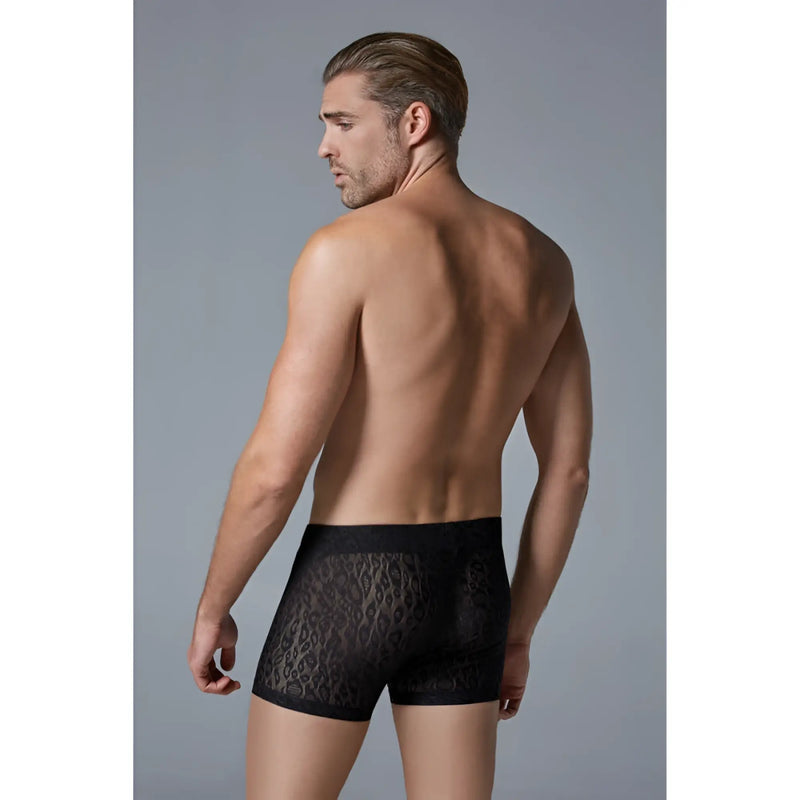 Back view of a man wearing sheer black leopard pattern boxer shorts.