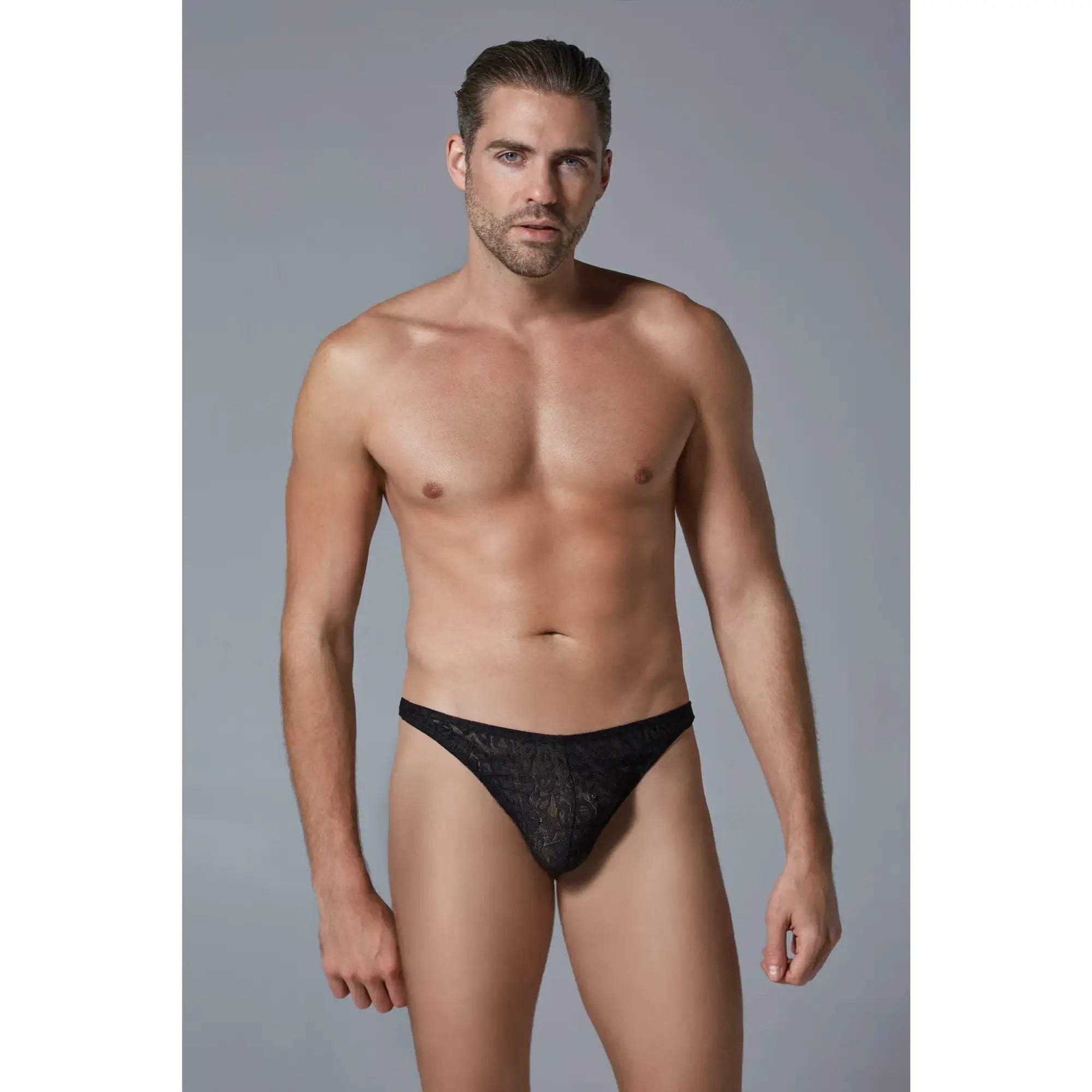 Black lace thong with intricate floral pattern from luca leopard mens thong collection showing front view