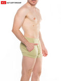 Light green soft textured men’s boxer briefs lumber jack lounge short with subtle elastic waistband and side pockets