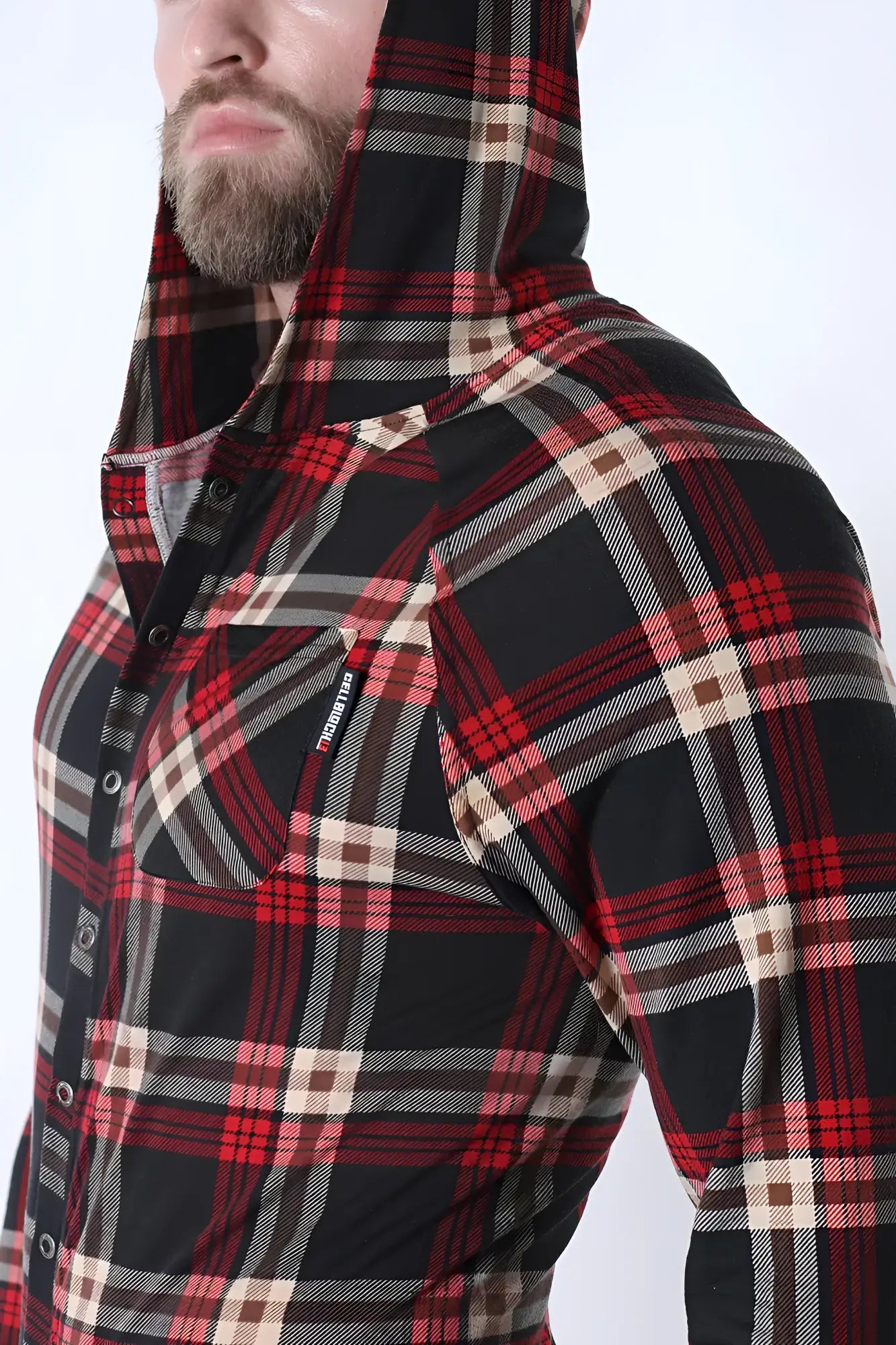 Red black and beige plaid hooded button-up shirt with branded patch on chest pocket in lumber jacked union suit style