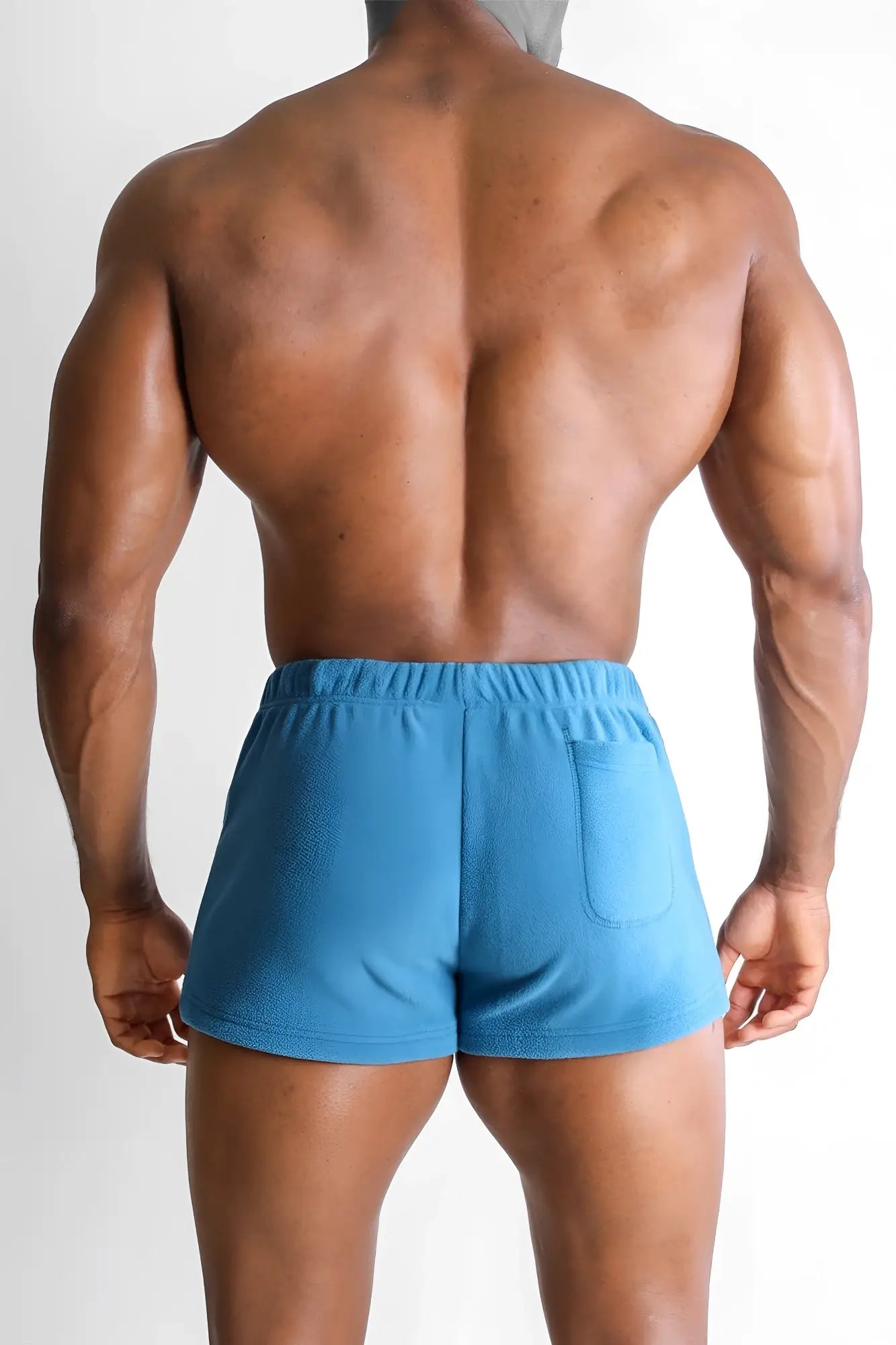 Blue fleece short shorts with elastic waistband and side pocket made from luxe plush fleece in baby blue