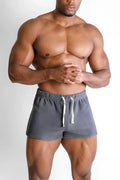 Gray luxe plush fleece 2 inch short shorts with white drawstrings made from soft cozy material